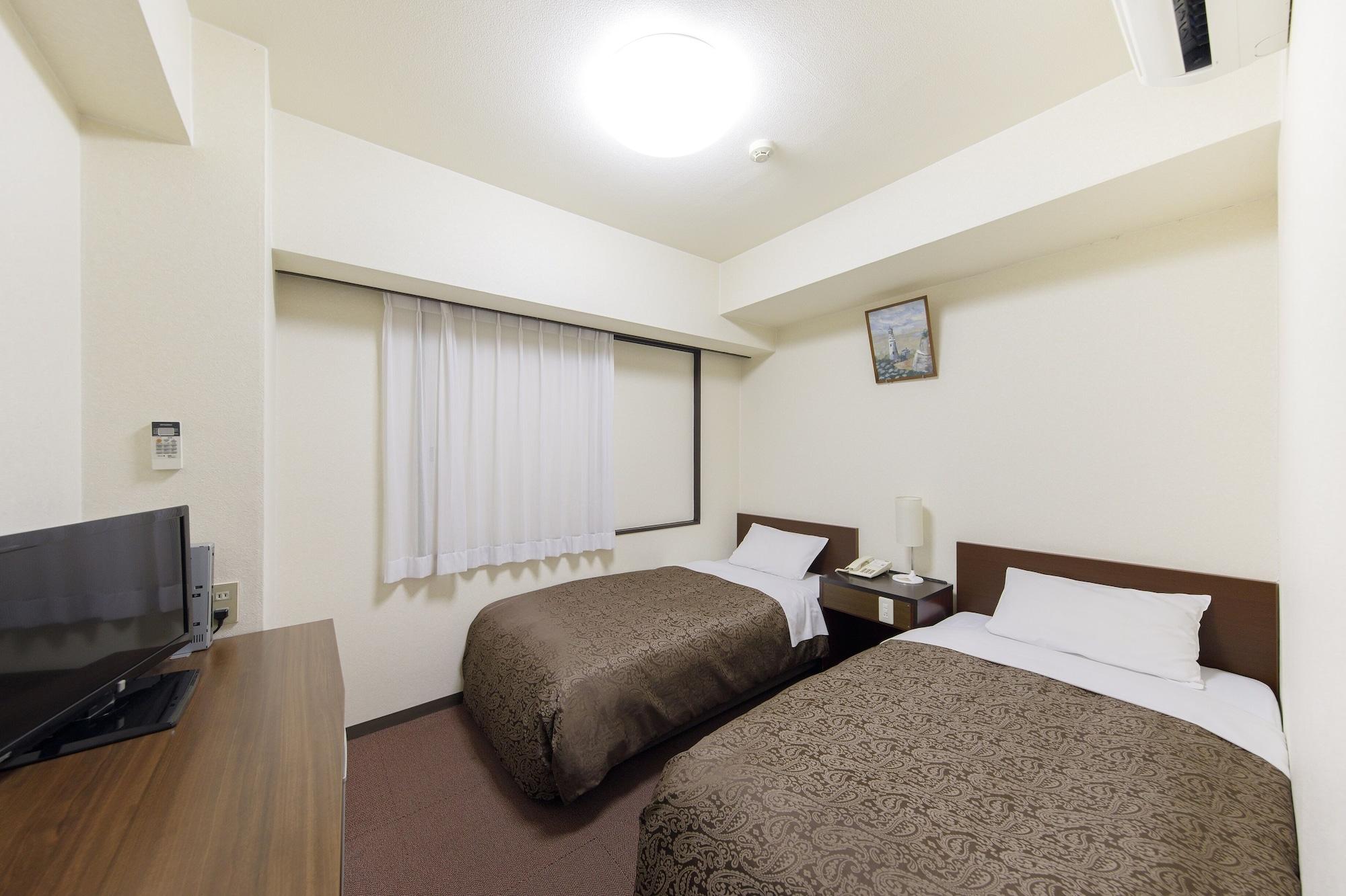 Dai-Ni Sunny Stone Hotel Suita Exterior photo