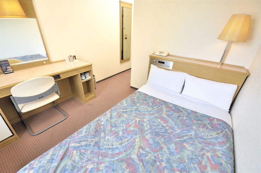 Dai-Ni Sunny Stone Hotel Suita Exterior photo