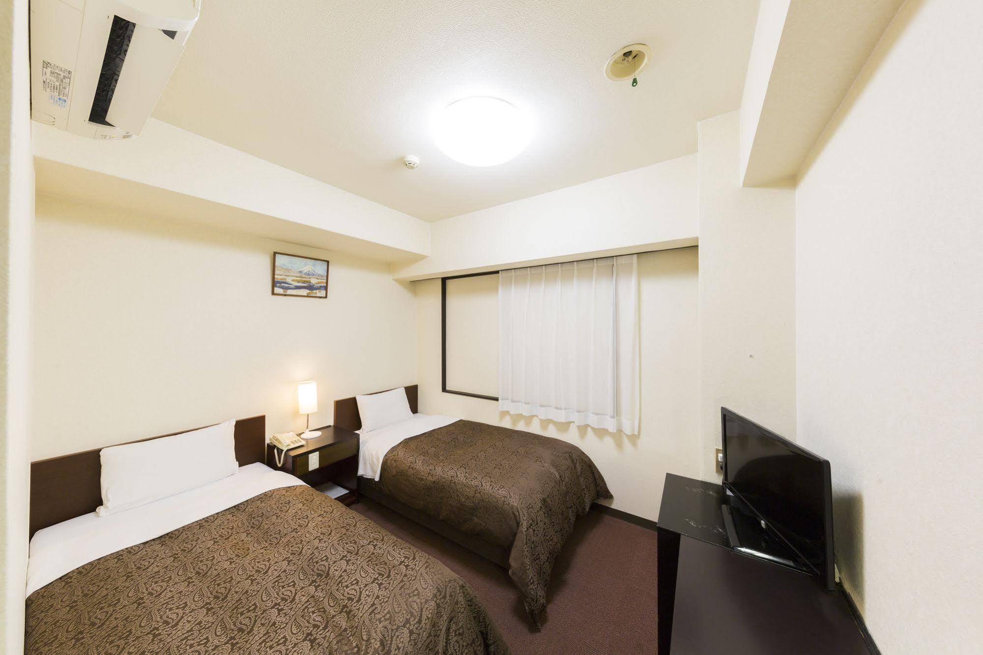 Dai-Ni Sunny Stone Hotel Suita Exterior photo