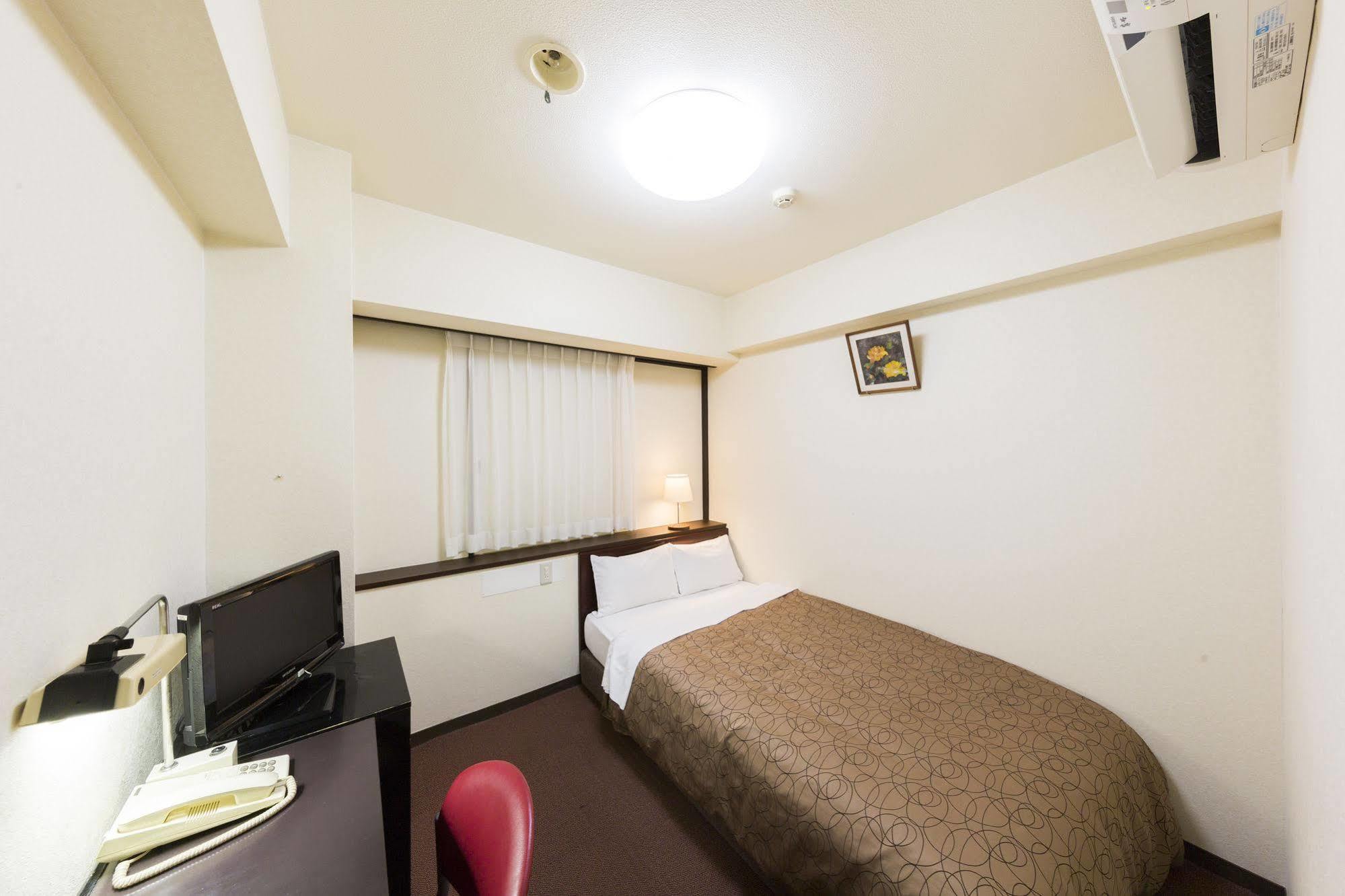Dai-Ni Sunny Stone Hotel Suita Exterior photo
