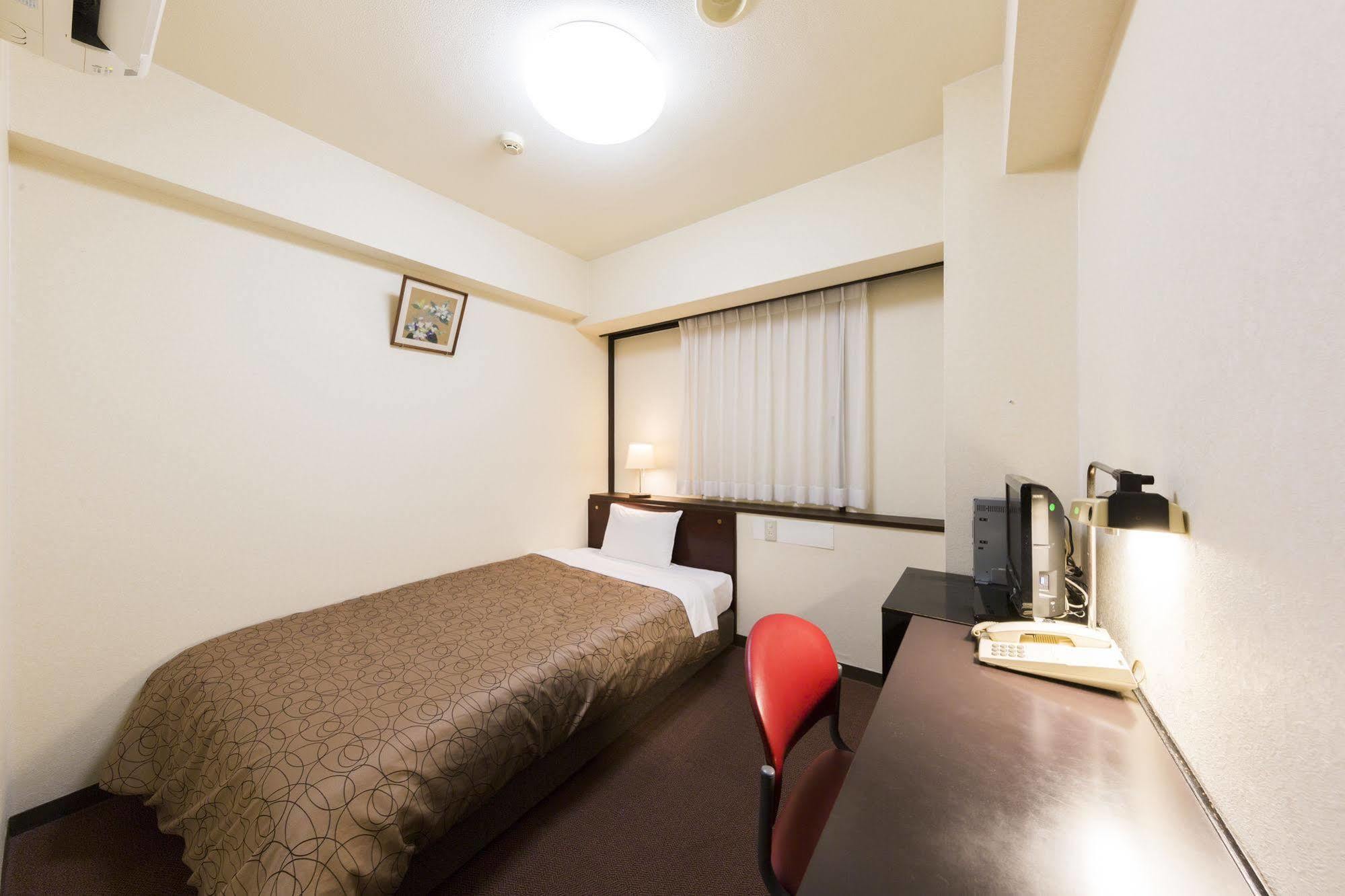 Dai-Ni Sunny Stone Hotel Suita Exterior photo